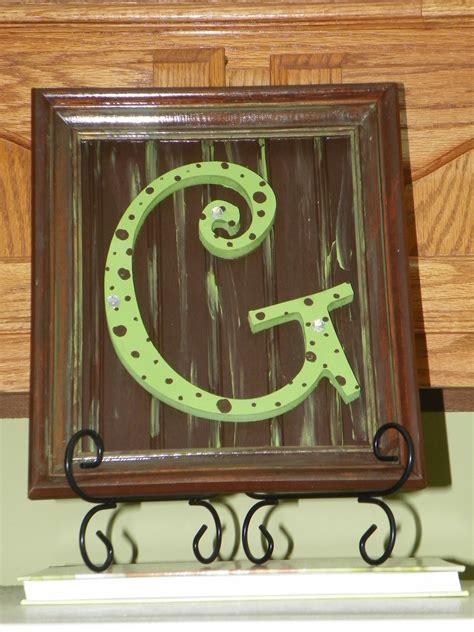 They're unique, affordable and feature artwork from independent artists across the world. Painted wooden initial framed. (With images) | Wooden ...