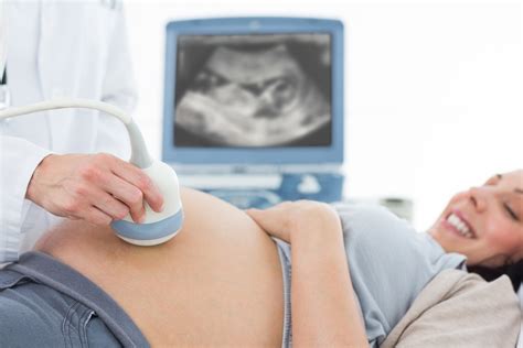 Pregnant Woman Undergoing Ultrasound Mri Scan Imaging Center