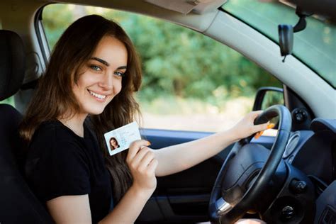 2100 Person Holding Drivers License Stock Photos Pictures And Royalty