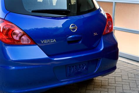 The honda fit is only available as a hatchback. 2012 Nissan Versa Hatchback Photos | Nissanhelp.com