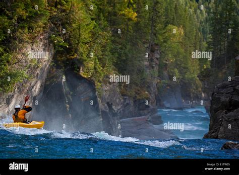 A Man Kayaks Overlander Falls Fraser River Mt Robson Provincial Park