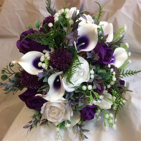 A Wedding Bouquet Of White And Purple Silk Flowers Purple Wedding