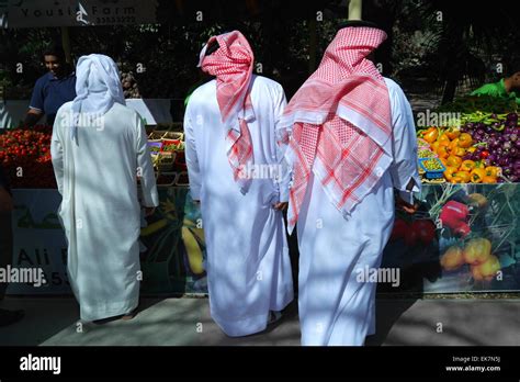 Bahraini Men Shopping At The Farmers Market Held At The Botanical