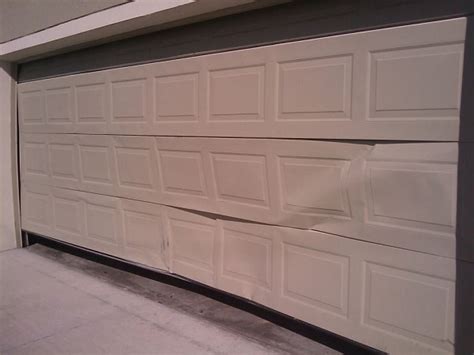 Dented Bentdamaged Garage Door Panels Jb Garage Door Repair Las