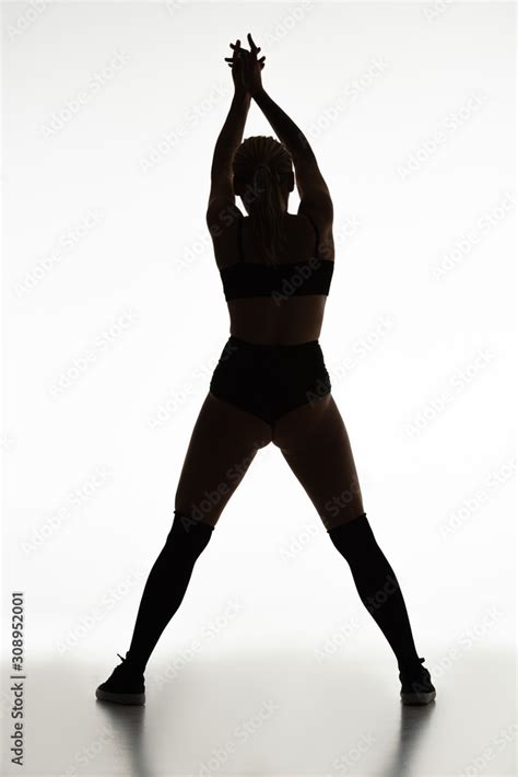 Back View Of Silhouette Of Sexy Girl Twerking Isolated On White Stock Photo Adobe Stock