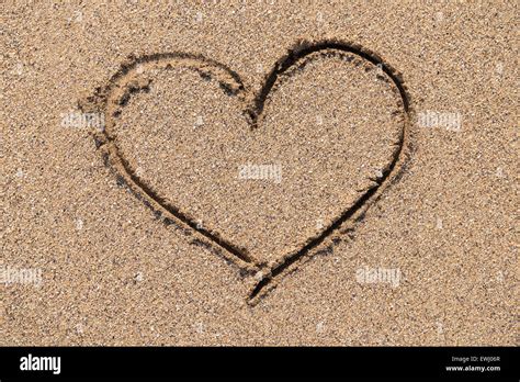 Heart Drawn On Ocean Beach Sand Stock Photo Alamy