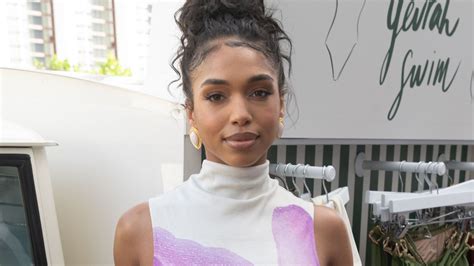 lori harvey goes braless in tight curve hugging dress as she attends shop opening for her yevrah