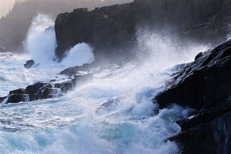 Waves Breaking Over Rocks Along The Newfoundland Coastlineby Geoffrey