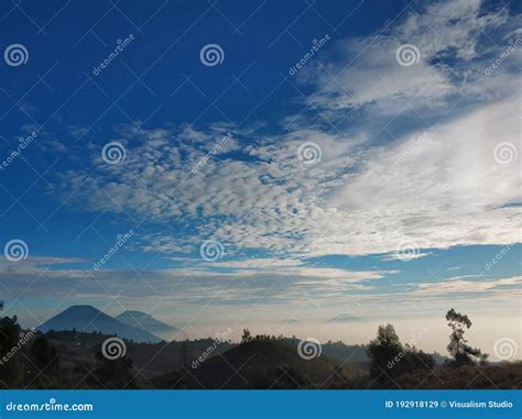 Beautiful Panorama Green Mountain With Green Forest And White Cloud And