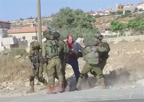 Caught On Tape Israeli Soldiers Beating Unarmed Palestinian Protester