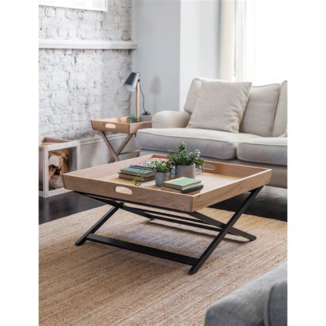 Zuchi coffee table in high gloss finish with metal slice effect $349 this uniquely design coffee table demands attention. Carbon Coffee Table | Tables | Living Room | New Season ...