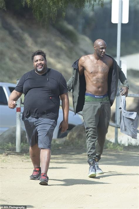 lamar odom chats up a pretty girl and gets shirtless on a hike daily mail online