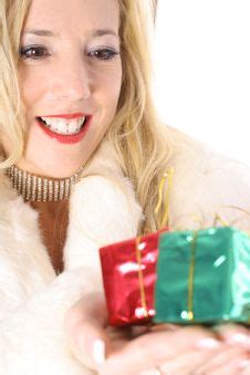 Happy Blonde Holding Presents Vertical Free Stock Photos