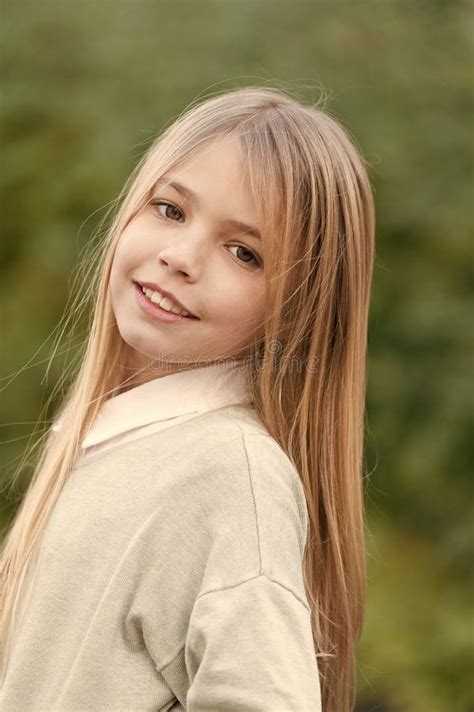 Little Girl Smile With Long Blond Hair Child With Cute Face Outdoor