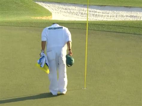 the caddie for masters champ hideki matsuyama bowed in respect to augusta national moments after