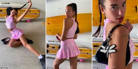 Dua Lipa Looks Sensational As She Poses In A Tiny Pink Crop Top And