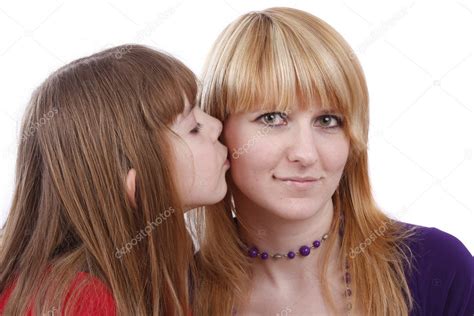 Daughter Kissing Her Happy Mother Stock Photo By ©irkusnya 1166964
