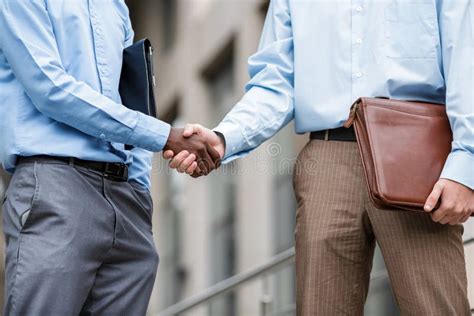 Two Businessmen Shaking Hands Stock Photo Image Of City Cooperation