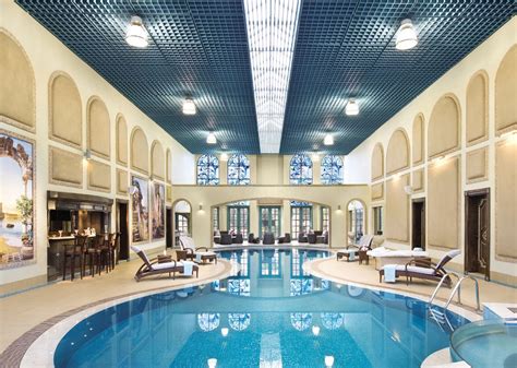 With white painted wood panelling on the walls, a brushed cement floor, stone accents, and lantern this indoor to outdoor swimming pool is about as unique as it gets. Best 46 Indoor Swimming Pool Design Ideas For Your Home