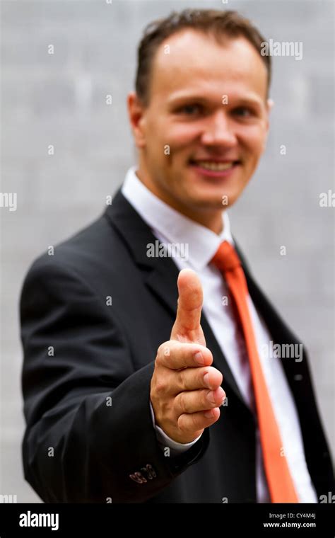 Young Businessman Offers A Hand Stock Photo Alamy