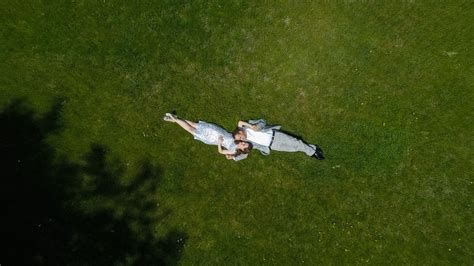 It is usually done while scuba diving, but can be done while diving on surface supply, snorkeling, swimming, from a submersible or remotely operated underwater vehicle, or from automated cameras lowered from the surface. Aerial engagement photos with drone. - Duluth, MN Wedding Photography