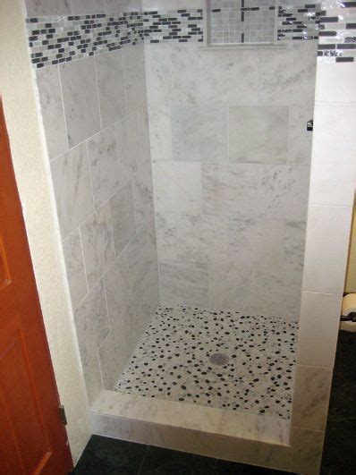 Here are some shower tile ideas that will help you to make the selection process smoother. Shower Stall Renovation Ideas | The tiling and grouting is ...
