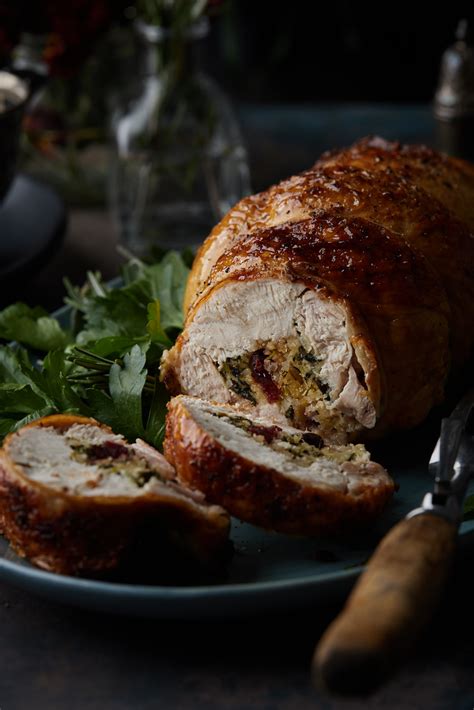 Roasted Turkey Breast Roulade With Cranberry Herb Stuffing Olive Mango