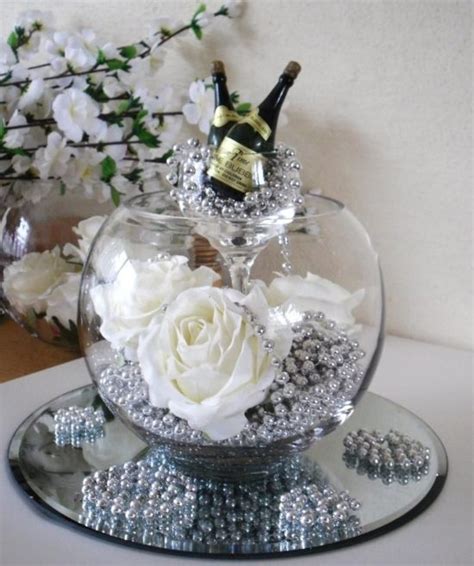 Arreglos de mesa para boda elegantes. Centros de mesa con peceras muy originales
