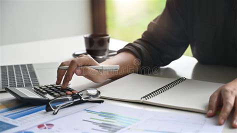 Female Accountant Or Banker Making Calculations Savings Budged Money