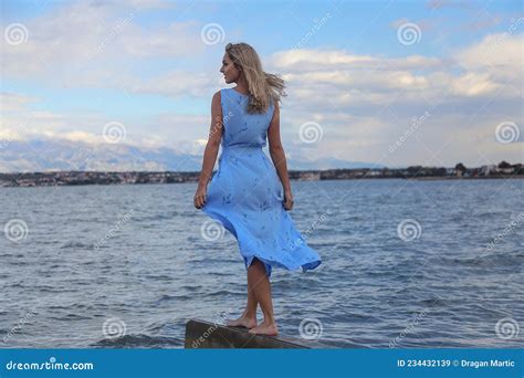 Beautiful Blonde Woman Posing On An Empty Sea Beach Stock Image Image Of Adventure Sand