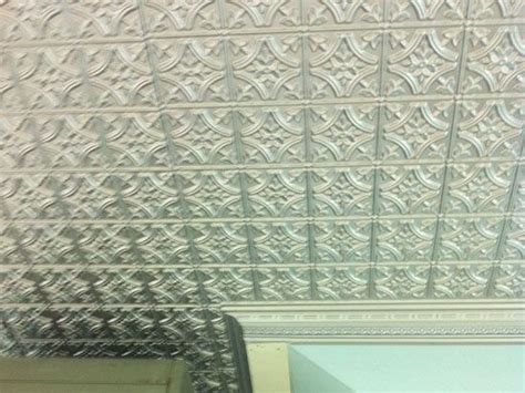 A simple drop ceiling is an excellent solution for the ceiling in your basement because one thing: Basement Ceiling Tile Ideas & Photos ...