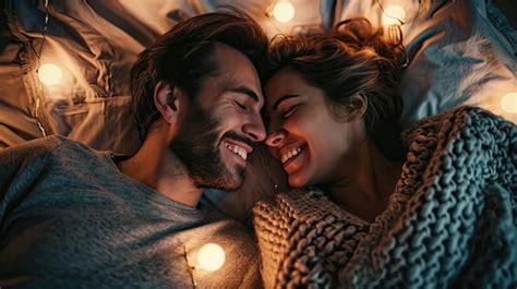 Premium Ai Image Happy Couple Is Lying In Bed Together Enjoying The Company Of Each Other