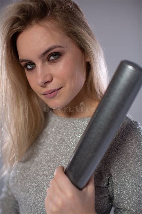 Beautiful Spectacular Blonde With A Baseball Bat In Her Hands Stock