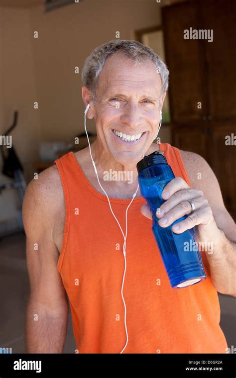 Older Man Drinking Water Bottle Stock Photo Alamy