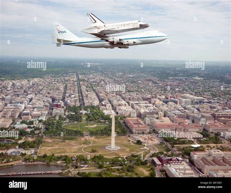 Handout Space Shuttle Discovery Mounted Atop A Nasa 747 Shuttle