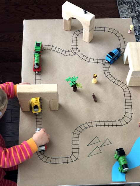 The newer and sleeker trains are a lot of fun to draw, and still start with simple shapes. Toddler Approved!: Easy DIY Paper Train Table for Kids