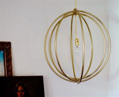 9 Ways To Craft With Hula Hoops Diy Hanging Light Diy Chandelier