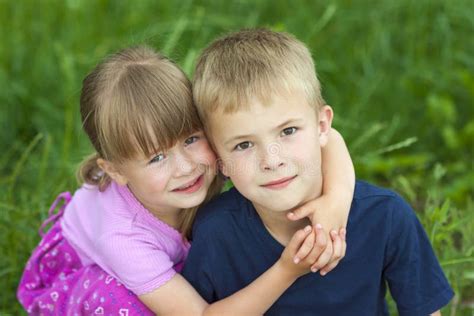 Children Brother And Sister Hugging Each Other Stock Photo Image Of