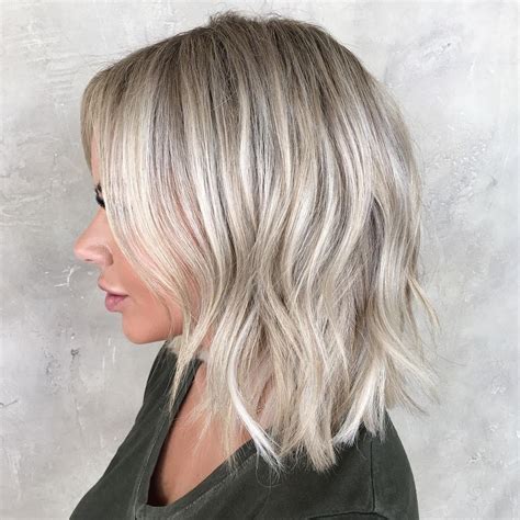 The blonde pieces are painted only on the front half of her hair, leaving behind a cute set of. 10 Of The Sexiest Shades For Platinum Blonde Hair You Will ...