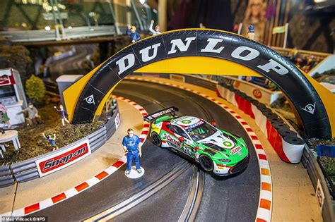 Warehouse Worker 53 Spends £10000 Building 165ft Scalextric Track At His Home Daily Mail Online