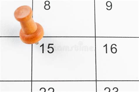 Embroidered Wooden Pin On A Blank Calendar On The 15th Stock Image