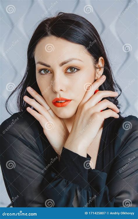 Fashion Portrait Of A Stylish Brunette Woman Wearing A Black Dress Woman With Long Hair Wearing