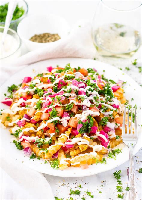 This recipe all starts with an awesome marinade comprised of olive oil, lemon juice, and lots of fragrant spices. Loaded Chicken Shawarma Fries (Video!) - The Girl on Bloor