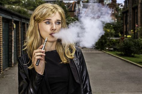 Pretty Woman Smoking An E Cigarette Stock Image Image Of
