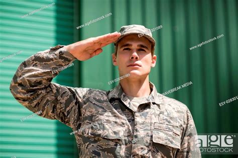 Close Up Of Military Soldier Giving Salute Stock Photo Picture And