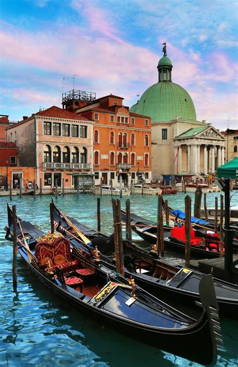 Gondolas With San Simeon Piccolo Church In Background In Venice Italy