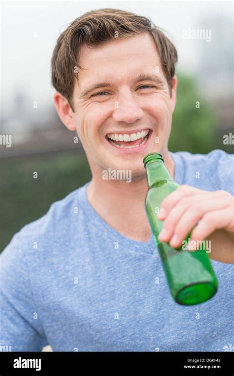 Portrait Of Man Drinking Beer Stock Photo Alamy
