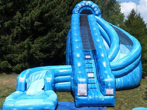 A backyard inflatable water slide is a great way to cool off in the hot days of summer while keeping your kids outside, having fun and being active. Naperville Water Slide Rental
