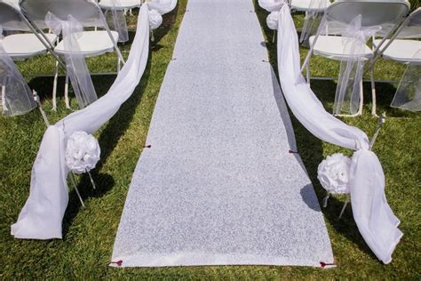 How To Secure A Wedding Aisle Runner On The Grass For An Outdoor