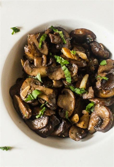 An aerial view of sauteed mushrooms cooked with garlic and white wine ...